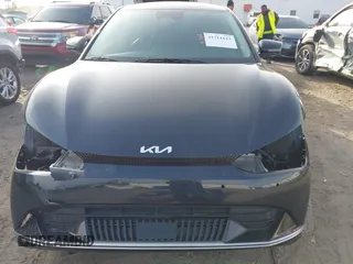 2023 Kia EV6 Wind z VIN KNDC34LA9P5127293, wystawiony jako IAAI lot #41711613 z przebiegiem 12 365 mil mil oraz . Historia ofert i sprzedaży dostępna na DreamBid. Obrazek 13.