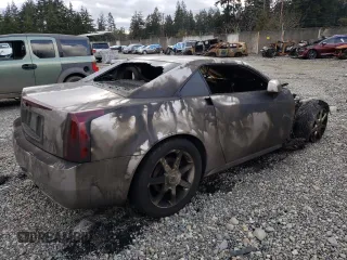 2004 Cadillac XLR z VIN 1G6YV34AX45601257, wystawiony jako Copart lot #44490755 z przebiegiem Nie podano mil oraz Szkody całkowita. Historia ofert i sprzedaży dostępna na DreamBid. Obrazek 3.