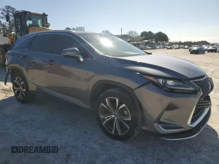 2021 Lexus RX with VIN JTJHZKEA9M2019949, listed as a Copart auction lot 52738375 with 51,917 mi miles and Salvage Title. Bid and sale history available at carsss.com. Image 4.