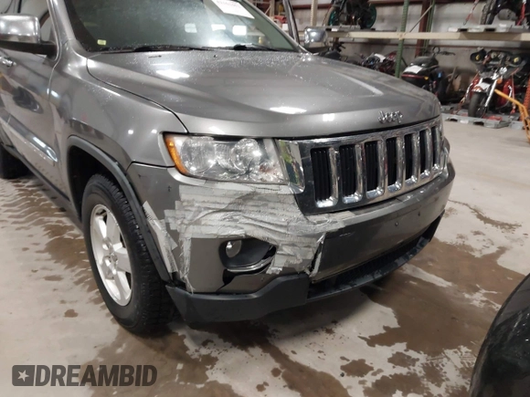 2011 Jeep Grand Cherokee Laredo with VIN 1J4RR4GG3BC623048, listed as a IAAI auction lot 42163452 with 192,241 mi miles and . Bid and sale history available at DreamBid. Image 6.