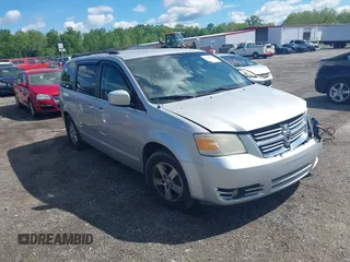2009 Dodge Grand Caravan SXT z VIN 2D8HN541X9R663021, wystawiony jako IAAI lot #42202983 z przebiegiem 255 173 mil mil oraz . Historia ofert i sprzedaży dostępna na DreamBid. Obrazek 1.