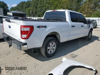 2021 Ford F-150 XL with VIN 1FTFW1E82MKD23506, listed as a Copart auction lot 71162334 with 71,387 mi miles and Salvage Title. Bid and sale history available at carsss.com. Image 3.