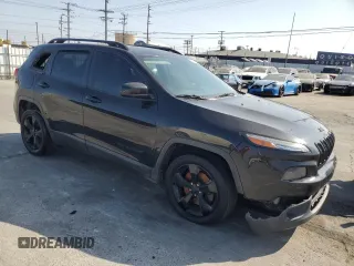 2016 Jeep Cherokee Altitude with VIN 1C4PJLCB1GW110282, listed as a Copart auction lot 54110325 with 137,978 mi miles and Clean title. Bid and sale history available at DreamBid. Image 4.