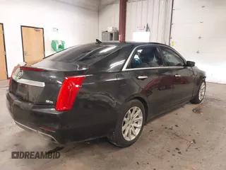 2014 Cadillac CTS Luxury AWD with VIN 1G6AX5S36E0173682, listed as a IAAI auction lot 41538709 with 102,772 mi miles and . Bid and sale history available at DreamBid. Image 4.