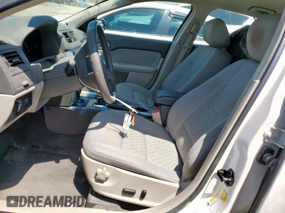 2012 Ford Fusion SE z VIN 3FAHP0HA9CR395558, wystawiony jako Copart lot #58925035 z przebiegiem 126 089 mil mil oraz Szkoda całkowita • Salvage title. Historia ofert i sprzedaży dostępna na DreamBid. Obrazek 7.
