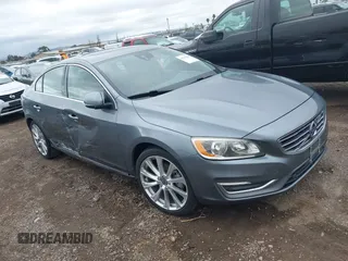 2017 Volvo S60 Inscription with VIN LYV402HK5HB154043, listed as a IAAI auction lot 41763769 with 136,736 mi miles. Bid and sale history available at carsss.com. Image 1.