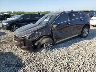 2021 Cadillac XT4 FWD Premium Luxury z VIN 1GYFZCR45MF002654, wystawiony jako Copart lot #52288105 z przebiegiem Nie podano mil oraz Szkody całkowita. Historia ofert i sprzedaży dostępna na DreamBid. Obrazek 1.