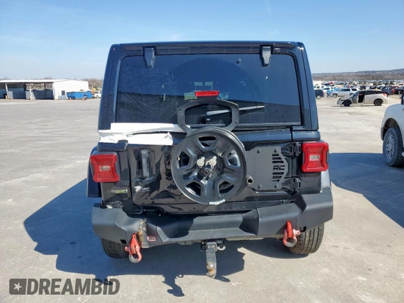 2021 Jeep Wrangler Unlimited Rubicon with VIN 1C4JJXFM9MW565029, listed as a Copart auction lot 44030695 with 76,510 mi miles and Salvage Title. Bid and sale history available at carsss.com. Image 6.