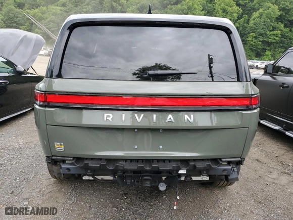 2022 Rivian R1S Launch Edition with VIN 7PDSGABL7NN001893, listed as a Copart auction lot 58809684 with 19,067 mi miles and Salvage Title. Bid and sale history available at carsss.com. Image 6.
