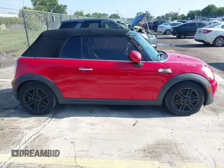 2014 MINI Convertible S с VIN WMWZP3C50ET298497, выставлен на аукционе IAAI как лот 42345812 с пробегом 119 921 миль миль и . История ставок и продаж доступна на DreamBid. Изображение 13.