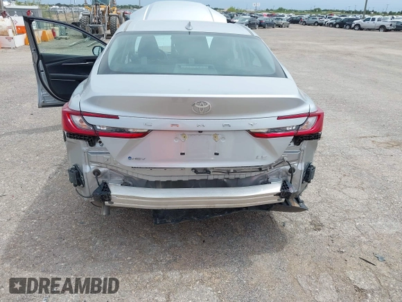 2025 Toyota Camry LE with VIN 4T1DAACK8SU512341, listed as a IAAI auction lot 42210426 with 14,276 mi miles and . Bid and sale history available at DreamBid. Image 6.