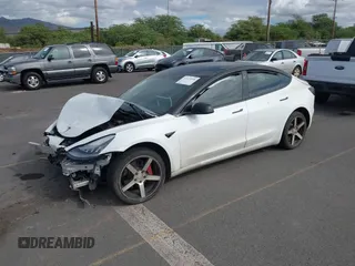 2019 Tesla Model 3 Mid Range with VIN 5YJ3E1EA6KF396946, listed as a IAAI auction lot 41123058 with 69,013 mi miles and . Bid and sale history available at carsss.com. Image 18.