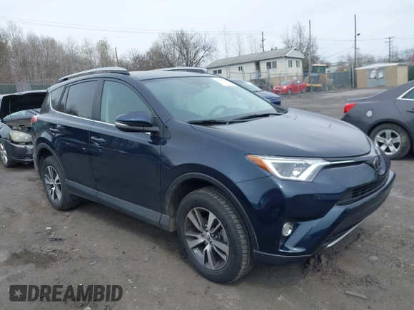 2018 Toyota RAV4 XLE with VIN 2T3RFREV9JW746782, listed as a IAAI auction lot 42065755 with 61,219 mi miles. Bid and sale history available at carsss.com. Image 1.