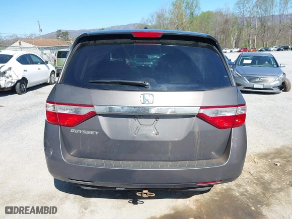 2011 Honda Odyssey EX-L with VIN 5FNRL5H60BB072101, listed as a IAAI auction lot 42002097 with 243,607 mi miles. Bid and sale history available at carsss.com. Image 16.