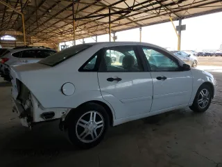 2002 Ford Focus SE with VIN 1FAFP343X2W156824, listed as a Copart auction lot 54834615 with 248,849 mi miles and Salvage Title. Bid and sale history available at carsss.com. Image 3.