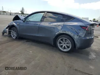 2023 Tesla Model Y Long Range with VIN 7SAYGDEE9PF885405, listed as a Copart auction lot 52858105 with 23,424 mi miles and Non Repairable. Bid and sale history available at DreamBid. Image 2.