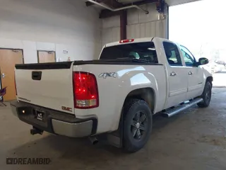 2012 GMC Sierra 1500 SLE with VIN 3GTP2VE77CG232123, listed as a IAAI auction lot 42020502 with 205,122 mi miles. Bid and sale history available at carsss.com. Image 4.