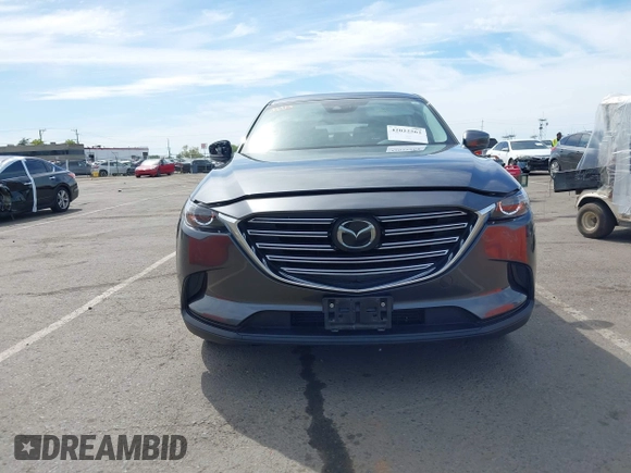 2021 Mazda CX-9 Sport with VIN JM3TCBBY7M0520437, listed as a IAAI auction lot 42022562 with 77,063 mi miles and . Bid and sale history available at DreamBid. Image 12.