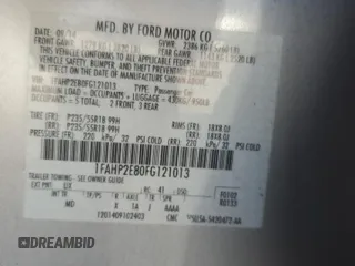 2015 Ford Taurus SEL with VIN 1FAHP2E80FG121013, listed as a Copart auction lot 59940235 with 209,632 mi miles and Clean title. Bid and sale history available at DreamBid. Image 12.