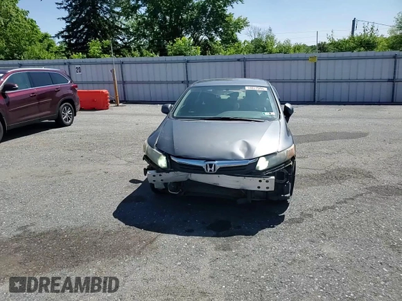 2012 Honda Civic LX z VIN 19XFB2F55CE360542, wystawiony jako Copart lot #59077995 z przebiegiem 139 751 mil mil oraz Szkoda całkowita • Salvage title. Historia ofert i sprzedaży dostępna na DreamBid. Obrazek 13.