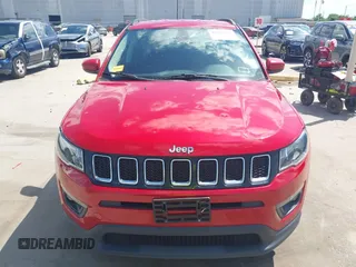 2017 Jeep Compass Latitude with VIN 3C4NJCBB2HT668657, listed as a IAAI auction lot 42027025 with 91,888 mi miles and . Bid and sale history available at DreamBid. Image 12.