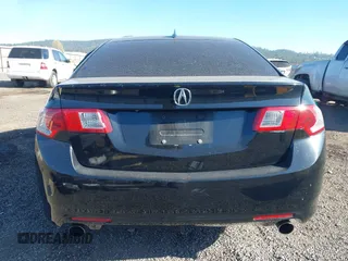 2009 Acura TSX with VIN JH4CU26659C021235, listed as a IAAI auction lot 42014591 with 201,036 mi miles. Bid and sale history available at carsss.com. Image 17.