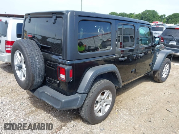2023 Jeep Wrangler Sport S with VIN 1C4HJXDN6PW599895, listed as a IAAI auction lot 42242107 with 53,980 mi miles and . Bid and sale history available at DreamBid. Image 4.