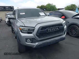 2020 Toyota Tacoma SR5 z VIN 3TMCZ5AN6LM288974, wystawiony jako IAAI lot #42185181 z przebiegiem 94 759 mil mil oraz . Historia ofert i sprzedaży dostępna na DreamBid. Obrazek 12.
