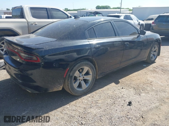 2015 Dodge Charger SXT with VIN 2C3CDXHG5FH928553, listed as a IAAI auction lot 42279342 with 129,402 mi miles and . Bid and sale history available at DreamBid. Image 4.