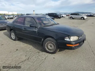 1993 Toyota Camry LE with VIN JT2SK12E4P0112014, listed as a Copart auction lot 52822095 with 249,458 mi miles and Salvage Title. Bid and sale history available at carsss.com. Image 4.