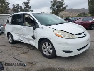2010 Toyota Sienna CE with VIN 5TDKK4CC3AS308035, listed as a IAAI auction lot 42200979 with 154,317 mi miles and . Bid and sale history available at DreamBid. Image 1.