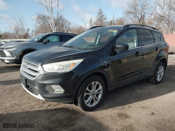 2017 Ford Escape SE with VIN 1FMCU0GD7HUD85843, listed as a IAAI auction lot 41874494 with 138,243 mi miles. Bid and sale history available at carsss.com. Image 19.