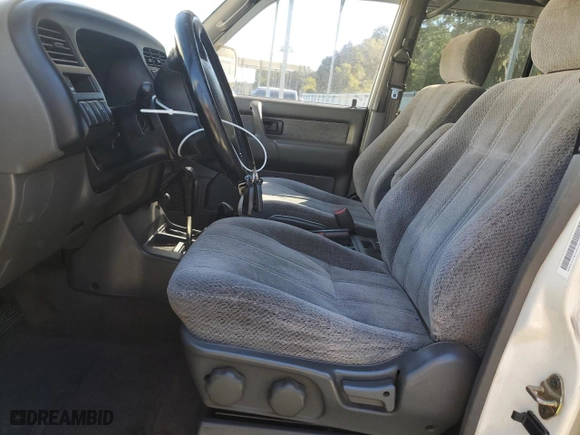 1999 Isuzu Trooper S with VIN JACDJ58X3X7917365, listed as a Copart auction lot 76065174 with 228,254 mi miles and Salvage Title. Bid and sale history available at carsss.com. Image 7.