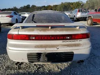 1993 Mitsubishi 3000GT z VIN JA3BM64J4PY006154, wystawiony jako Copart lot #76087934 z przebiegiem 135 641 mil mil oraz Szkody całkowita. Historia ofert i sprzedaży dostępna na DreamBid. Obrazek 6.