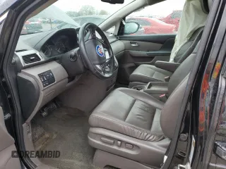 2014 Honda Odyssey Touring z VIN 5FNRL5H91EB063390, wystawiony jako Copart lot #54482545 z przebiegiem Nie podano mil oraz Szkoda całkowita • Salvage title. Historia ofert i sprzedaży dostępna na DreamBid. Obrazek 7.