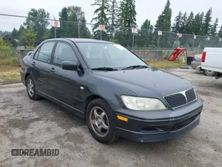 2002 Mitsubishi Lancer OZ-Rally z VIN JA3AJ86EX2U059845, wystawiony jako IAAI lot #42371709 z przebiegiem 207 665 mil mil oraz . Historia ofert i sprzedaży dostępna na DreamBid. Obrazek 1.