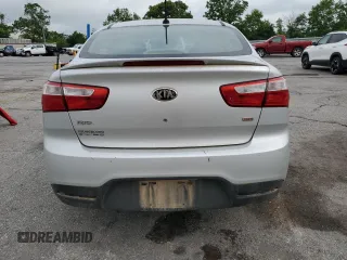 2013 Kia Rio LX z VIN KNADM4A35D6280066, wystawiony jako Copart lot #57293585 z przebiegiem 129 281 mil mil oraz Szkoda całkowita • Salvage title. Historia ofert i sprzedaży dostępna na DreamBid. Obrazek 6.