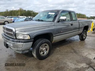 1995 Dodge 1500 with VIN 3B7HF13Z0SM185796, listed as a Copart auction lot 79131814 with 184,890 mi miles and Salvage Title. Bid and sale history available at DreamBid. Image 1.