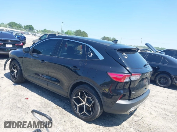 2021 Ford Escape SE z VIN 1FMCU0G66MUB26983, wystawiony jako IAAI lot #42144053 z przebiegiem 60 614 mil mil oraz . Historia ofert i sprzedaży dostępna na DreamBid. Obrazek 3.