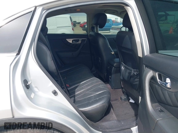 2009 Infiniti FX with VIN JNRAS18U79M100386, listed as a IAAI auction lot 41738262 with 155,265 mi miles and . Bid and sale history available at DreamBid. Image 8.
