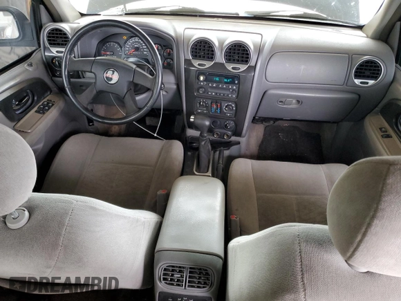 2005 GMC Envoy SLE z VIN 1GKDT13S552130173, wystawiony jako Copart lot #50766595 z przebiegiem Nie podano mil oraz Czysty tytuł • Clean title. Historia ofert i sprzedaży dostępna na DreamBid. Obrazek 8.