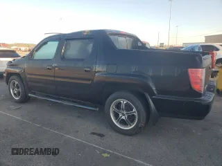 2010 Honda Ridgeline RTL with VIN 5FPYK1F58AB007262, listed as a Copart auction lot 74173034 with 94,078 mi miles and Salvage Title. Bid and sale history available at carsss.com. Image 2.