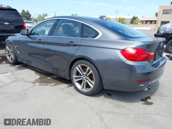 2015 BMW 4 Series 428i with VIN WBA4A5C59FGK15750, listed as a IAAI auction lot 42098856 with 62,530 mi miles and . Bid and sale history available at DreamBid. Image 3.