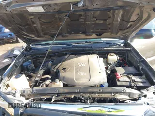 2014 Toyota Tacoma with VIN 3TMLU4EN3EM143882, listed as a IAAI auction lot 40657975 with 125,008 mi miles. Bid and sale history available at carsss.com. Image 10.