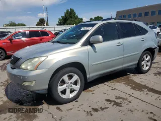 2005 Lexus RX 330 with VIN JTJGA31U350051558, listed as a Copart auction lot 60489215 with 216,702 mi miles and Salvage title. Bid and sale history available at DreamBid. Image 1.
