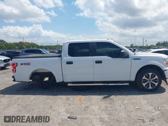 2019 Ford F-150 XL with VIN 1FTEW1CP9KKC27035, listed as a IAAI auction lot 41994993 with 125,879 mi miles and . Bid and sale history available at carsss.com. Image 14.