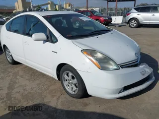 2009 Toyota Prius with VIN JTDKB20U093484619, listed as a IAAI auction lot 42110058 with 223,010 mi miles. Bid and sale history available at carsss.com. Image 1.