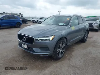2018 Volvo XC60 Momentum z VIN LYV102RK1JB079168, wystawiony jako IAAI lot #42115403 z przebiegiem 58 377 mil mil oraz . Historia ofert i sprzedaży dostępna na DreamBid. Obrazek 17.