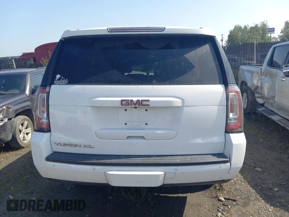 2019 GMC Yukon XL SLT with VIN 1GKS2GKC1KR279755, listed as a Copart auction lot 64695394 with 0 mi miles and Salvage Title. Bid and sale history available at carsss.com. Image 6.