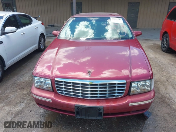 1999 Cadillac DeVille z VIN 1G6KD54Y4XU718666, wystawiony jako IAAI lot #42327746 z przebiegiem 84 226 mil mil oraz . Historia ofert i sprzedaży dostępna na DreamBid. Obrazek 6.